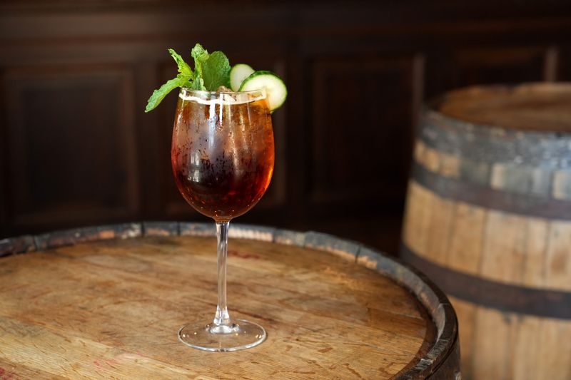 A Pimm's Cup, a gin-based British summer cocktail, at The Ambleside Pub in Mount Kisco, NY May 12, 2026. British-born Drew Hodgson and his American-born wife, Leigh, opened the authentic British bar in 2024.