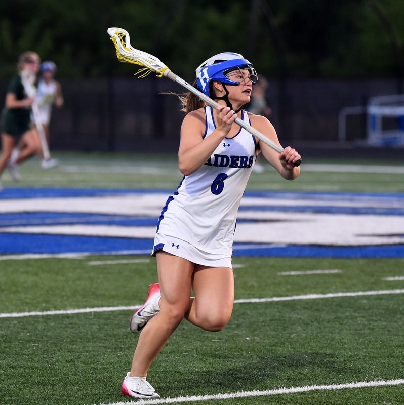 Horseheads' Lauren Kozemko (6) with the ball as the Blue Raiders defeated Vestal, 19-4, in the Section 4 Class B girls lacrosse championship game May 29, 2026 at Horseheads High School.