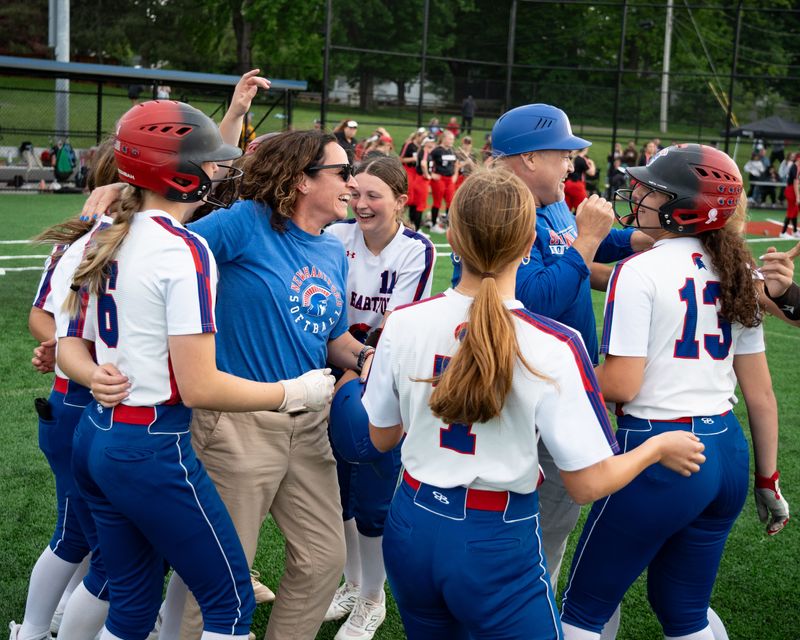 New Hartford celebrates after defeating Chittenango 12-11 in Section III's Class A softball championship game Friday at Carrier Park in Syracuse.
