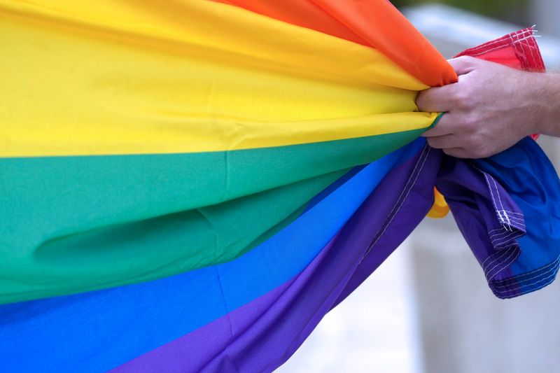 Milwaukee County employee, Joe De Gail, keeps a tight rein on the Intersex Progress Pride Flag before it was raised at Milwaukee County Courthouse for the kick off of Pride Month on June 1, 2026 at 930 W. Wells St., in Milwaukee, Wisconsin.
