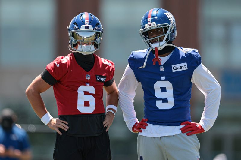 Jun 3, 2026; East Rutherford, NJ, USA; New York Giants quarterback Jaxson Dart (6) and wide receiver Isaiah Likely (9) talk during organized team activities at Quest Diagnostics Training Center. Mandatory Credit: Vincent Carchietta-Imagn Images