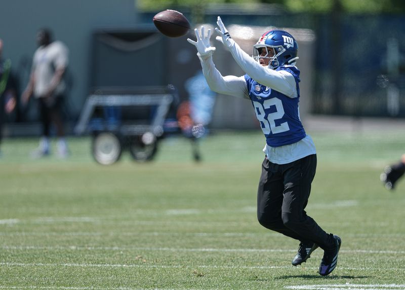Jun 3, 2026; East Rutherford, NJ, USA; New York Giants wide receiver Calvin Austin III (82) catches the ball during organized team activities at Quest Diagnostics Training Center. Mandatory Credit: Vincent Carchietta-Imagn Images