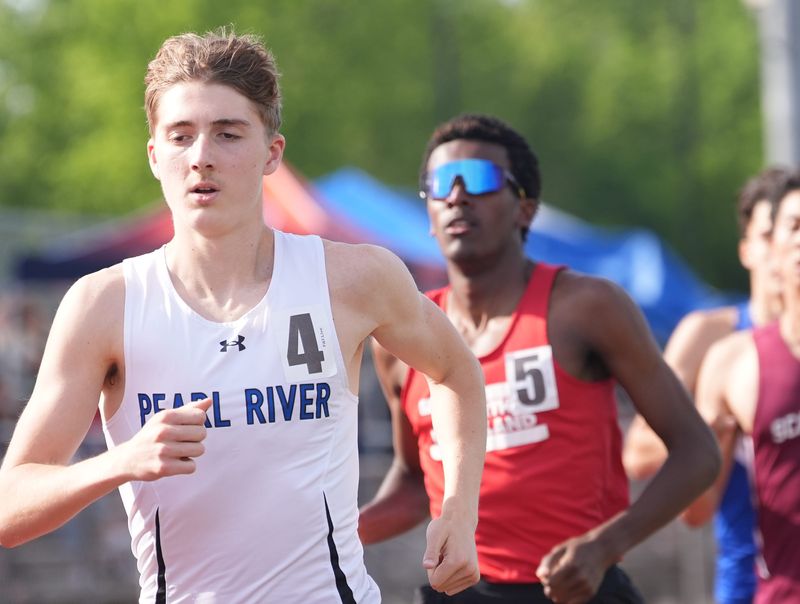 Pearl River's Jayden Lloyd McKenna, left, wins the 800-meter at the Section 1 State Qualifier Track & Field Meet at Arlington High School in LaGrangeville on Thursday, June 4, 2026.