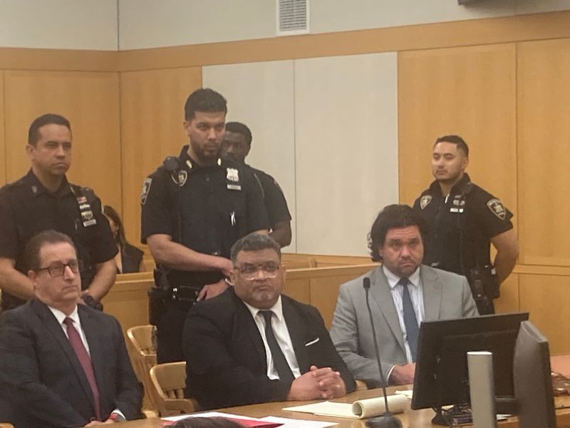 John Singh, center, in Westchester County Court June 5, 2026, as jury forewoman announces guilty verdict on murder and manslaughter charges in Nov. 16, 2024 stabbing death of his brother-in-law Bernard Barua in Yonkers.