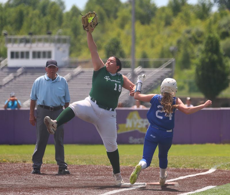 Spackenkill’s Adriana Alessandro reaches for the ball as Dobbs Ferry’s Kamryn Addis sprints to first base during the NYPHSAA Class B Regional Championship on June 5, 2026.