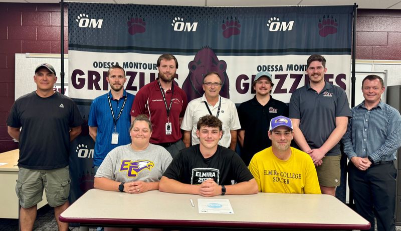 Odessa-Montour senior Patrick Croft, front center, at a signing celebration at O-M High School on June 11, 2026. Croft has committed to play men's soccer at Elmira College.