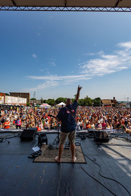 A member of the band Showtime overlooks the crowd at the 2024 Boilermaker.