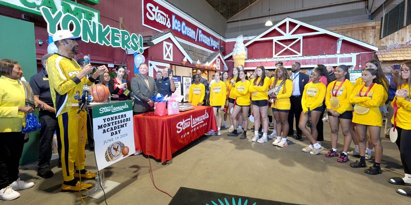 New York Knicks legend Walt “Clyde” Frazier addresses the Yonkers Montessori Academy girls basketball team at Stew Leonard's in Yonkers June 16, 2026. The team won the New York State Class B championship, the first by a Yonkers school in 94 years.