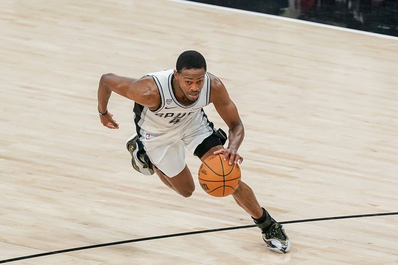 Jun 13, 2026; San Antonio, Texas, USA; San Antonio Spurs guard De'aaron Fox (4) drives to the basket against the New York Knicks during game five of the 2026 NBA Finals at Frost Bank Center. Mandatory Credit: Dustin Safranek-Imagn Images