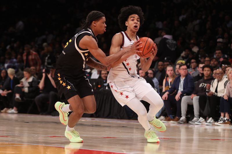 Apr 1, 2025; Brooklyn, NY, USA; McDonald's All American West guard Mikel Brown Jr. (11) dribbles the ball against McDonald's All American East guard Darius Acuff Jr. (5) during the first half of the game at Barclays Center. Mandatory Credit: Pamela Smith-Imagn Images