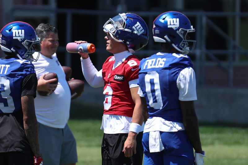 Jun 9, 2026; East Rutherford, NJ, USA; New York Giants quarterback Jaxson Dart (6) takes a drink during a break at minicamp at Quest Diagnostics Center. Mandatory Credit: Thomas Salus-Imagn Images