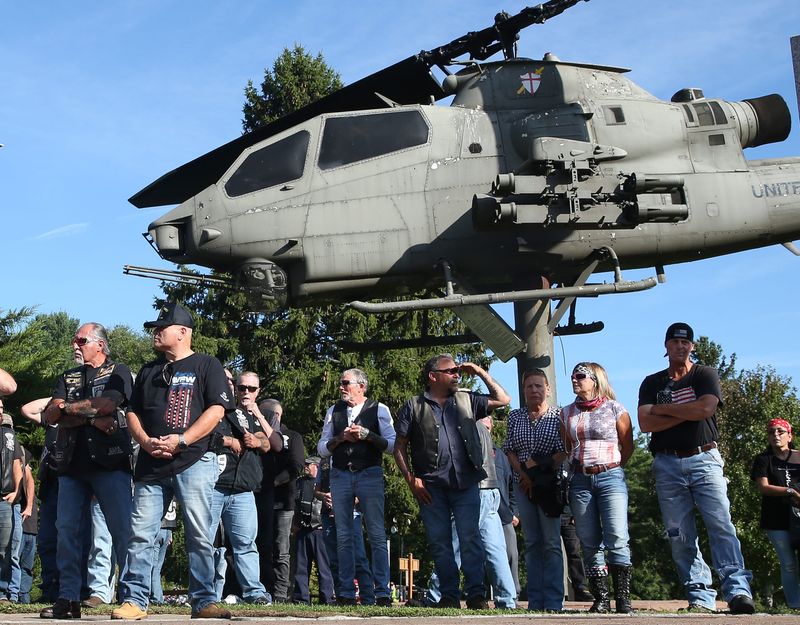 Veterans watch as the Traveling Vietnam Wall rolled into Putnam County led by an escort of veterans on motorcycles and firefighters Sept. 22, 2022. The Wall will be on display at the Putnam County Veterans Memorial Park in Carmel.