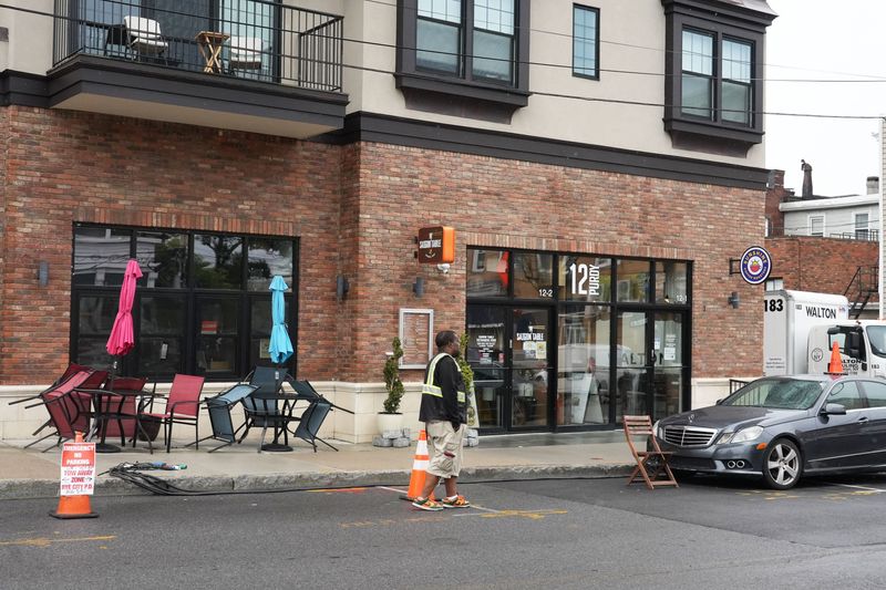 Crews prepare for filming at Sunshine Coffee Roasters in Rye June 23, 2026.