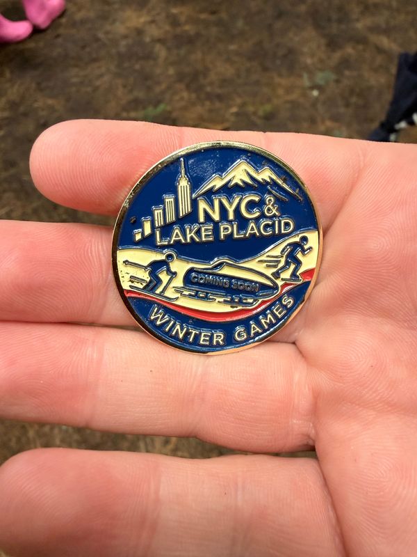 A commemorative pin heralds the possibility of a joint New York City-Lake Placid bid for an Olympic Winter Games.