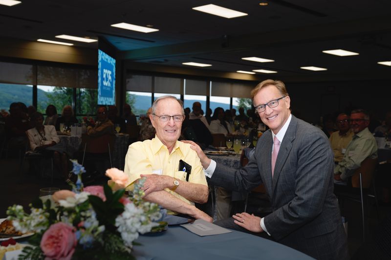 Corning CEO Wendell Weeks with Lee Vancuren during the annual Service Awards Luncheon June 25, 2026, honoring retirees who began their careers with the company 50 and 75 years ago.
