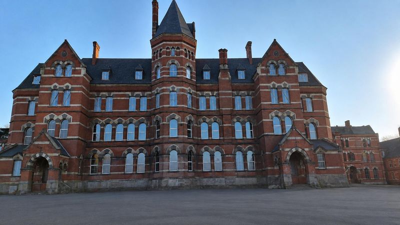 The main administration building at the former Hudson River Psychiatric Center after the new roof, windows and structural supports were implemented following the 2018 fire. In June 2026, fire swept through the north wing, main administration building and south wing.