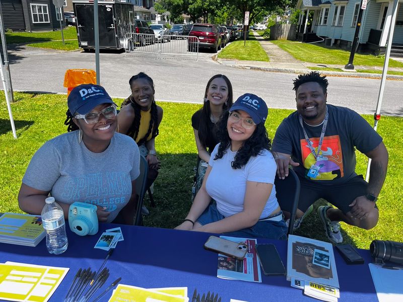 Democrat and Chronicle staff, Justice Marbury, Marili Vaca, Genae Shields, Madison Scott and Robert Bell, pictured tabling at the 19th Ward Square Fair in 2024.
