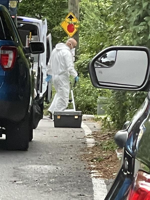 Forensic investigators and members of the DA's office were on Butler Road in Scarsdale where a woman was found dead in her home early on July 7, 2026