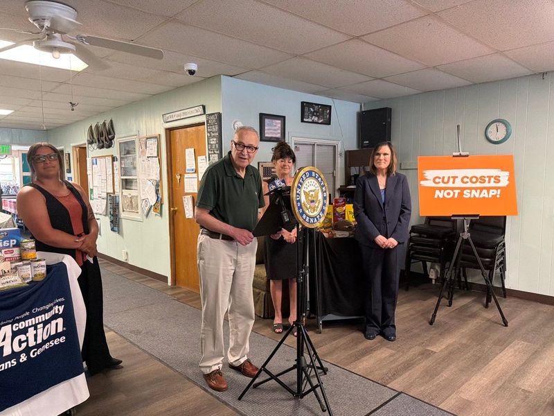 U.S. Senator Chuck Schumer stood at Community Action of Orleans and Genesee on July 2 with families and local officials to launch his push for a two-year delay in SNAP cost shifts.