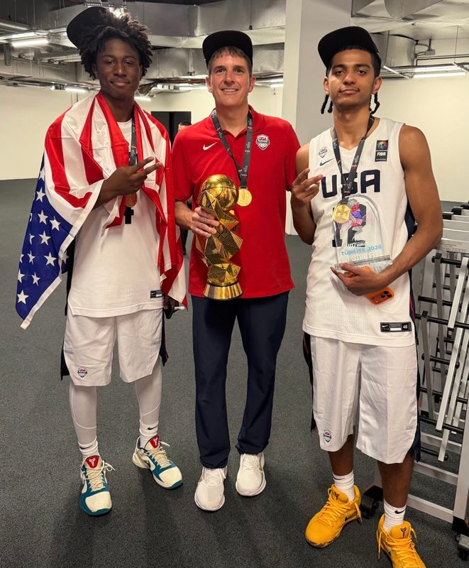 Fairport boys’ basketball coach Scott Fitch (center) celebrates with NaVorro Bowman, Jr. (left) and Beckham Black (right) after coaching Team USA to gold at the FIBA U17 World Cup in Istanbul, Turkey.