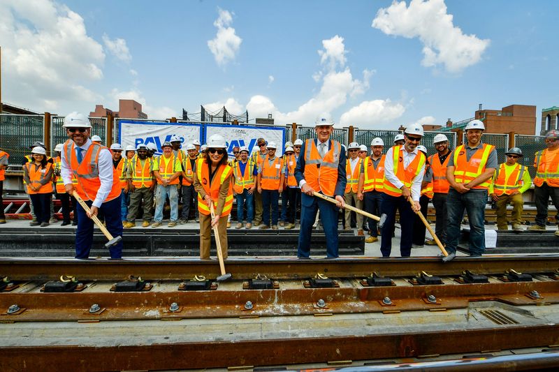 MTA Metro-North Railroad President Justin Vonashek, MTA Chair and CEO Janno Lieber, Gov. Kathy Hochul, and MTA Construction and Development President Jamie Torres-Springer drive in ceremonial clips to Park Avenue Viaduct project completion in Harlem on July 27, 2026.