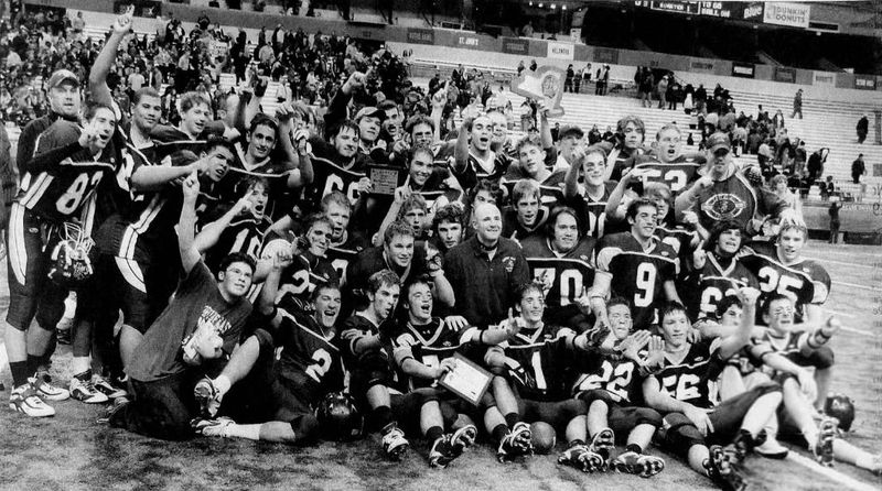 Corning East celebrates after winning the 2006 Class A football championship.