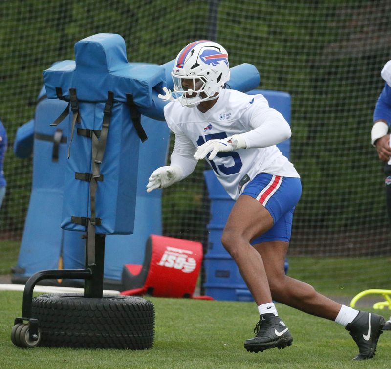 Bills linebacker Greg Rousseau cuts around a blocking sled during day two of Bills training camp.