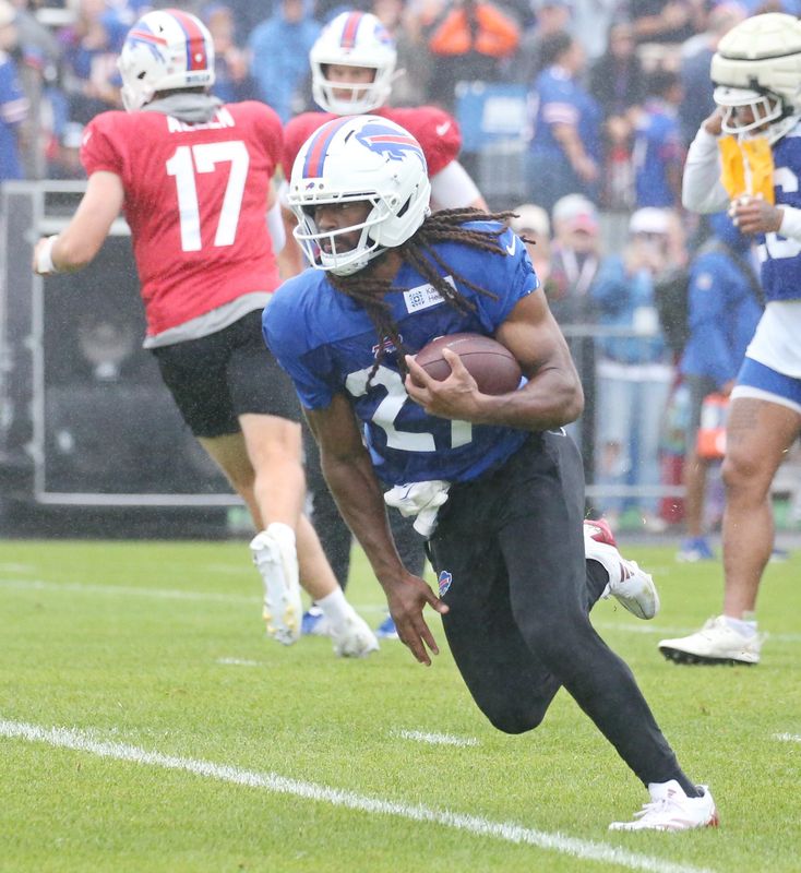 Bills running back Ian Wheeler runs hard up the middle during day four of Buffalo Bills training camp at St. John Fisher University Monday, August 3, 2026 in Pittsford.