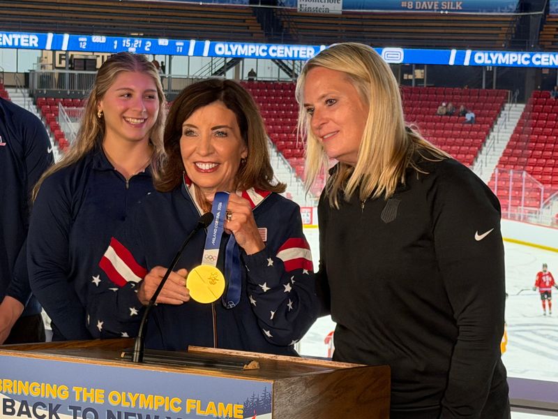 New York Gov. Kathy Hochul toured the Olympic Center in Lake Placid on Monday, Aug. 3, 2026, and held the U.S. Women's National Ice Hockey Team's 2026 gold medal inside the Herb Brooks Arena.