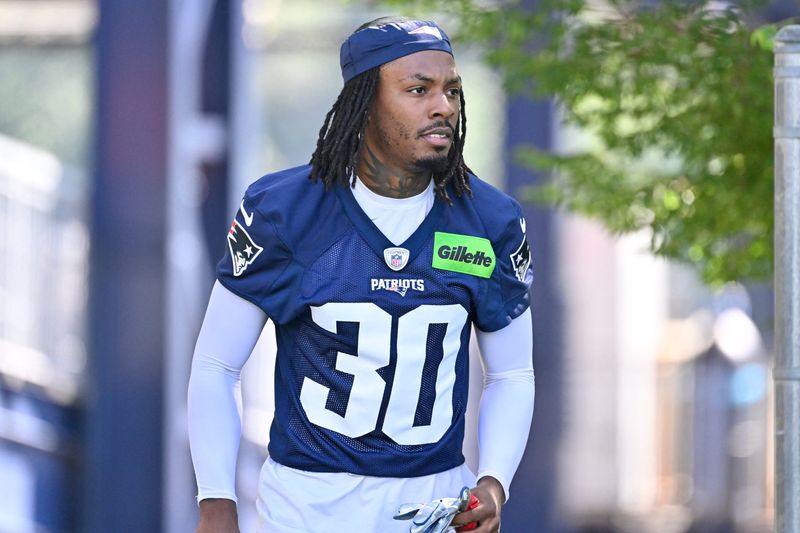 Jul 23, 2025; Foxborough, MA, USA; New England Patriots cornerback DJ James (30)  walks to the practice field for training camp at Gillette Stadium. Mandatory Credit: Eric Canha-Imagn Images