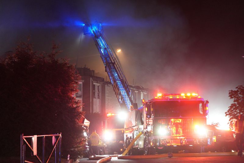 Ossining firefighters with help from several neighboring  departments battle a multi-alarm fire that swept through a multi-unit apartment complex at Parth Knolls on Hawkes Ave in Ossining Aug. 7, 2026. The blaze which may have been started by a lightning strike, left dozens homeless.