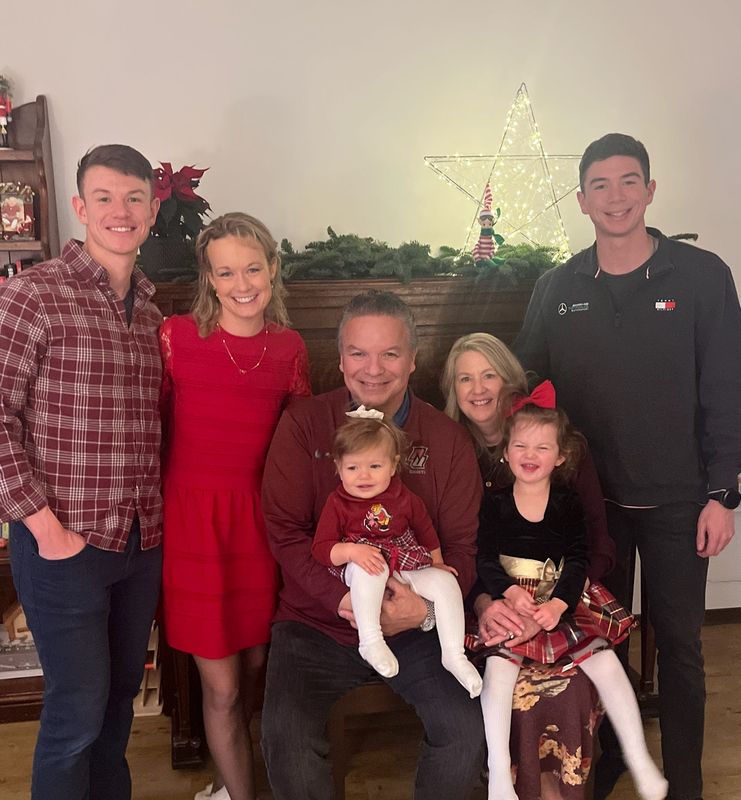 Michael Printup with his wife, Stephanie, their sons Matthew and Brendan; Brendan's wife, Caitlin; and Brendan and Caitlin's daughters Sophia and Vivienne.