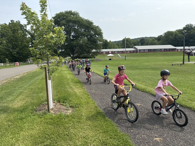 About 30 kids from The Y at Watson Woods kids camp recently tested out a new walking/biking trail at The Y at Watson Woods, with 50 new maple trees planted alongside the trail.