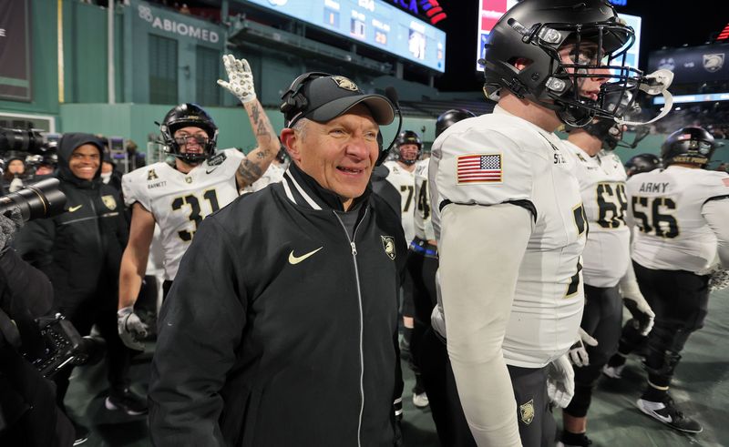 Dec 27, 2025; Boston, MA, USA; Army Black Knights head coach Jeff Monken celebrates a touchdown against the UConn Huskies during the second half of the Wasabi Fenway Bowl at Fenway Park. Mandatory Credit: Danny Wild-Imagn Images