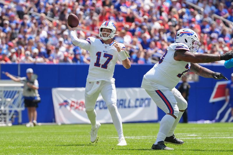Aug 15, 2026; Orchard Park, New York, USA; Buffalo Bills quarterback Josh Allen (17) throws the ball aginst the Carolina Panthers during the first half at New Highmark Stadium. Mandatory Credit: Gregory Fisher-Imagn Images