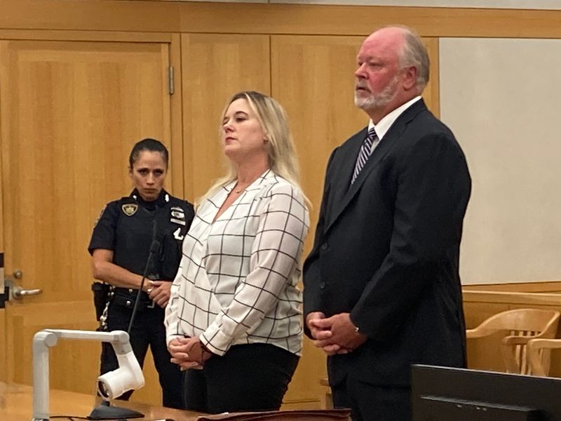 Former NYPD Sgt. Tiffany Howell with her lawyer Andrew Quinn as she pleads guilty in Westchester County Court Aug. 19, 2026, in the drunken wrong way crash that killed Manuel Boitel of Peekskill on the Taconic State Parkway on Jan. 22, 2026.