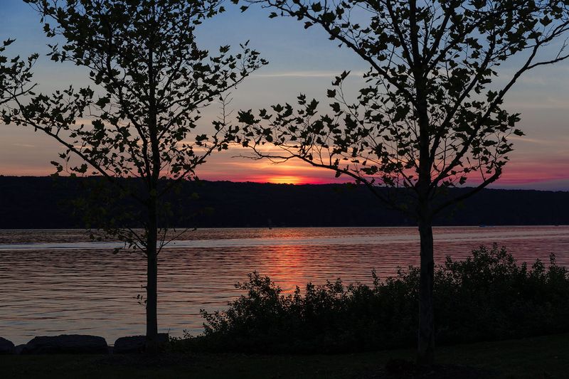 The New York State Department of Environmental Conservation (DEC) and Finger Lakes Land Trust have announced a land acquisition that aims to protect Ithaca’s water supply. This includes acreage near Cayuga Lake, pictured here at sunset, in this Ithaca Journal file photo. File photo/Ithaca Journal