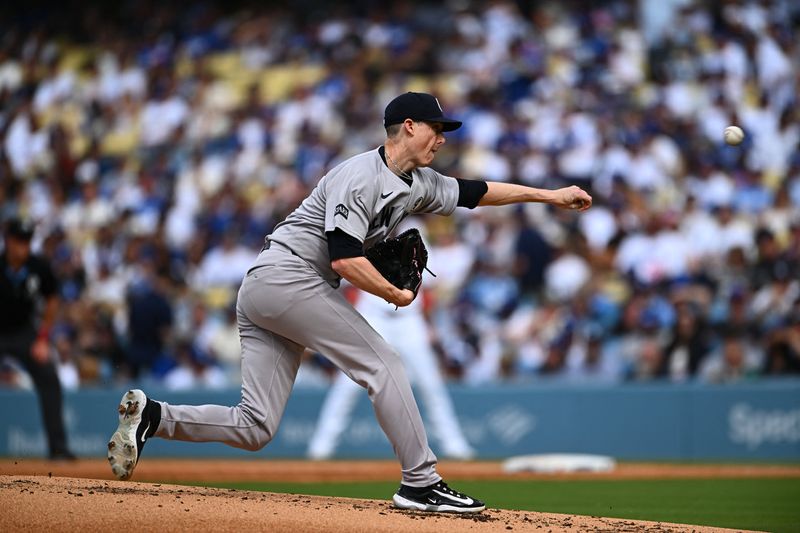 Jun 1, 2025; Los Angeles, California, USA;  New York Yankees relief pitcher Ryan Yarbrough (33) throws a pitch against the Los Angeles Dodgers during the first inning at Dodger Stadium. Mandatory Credit: Jonathan Hui-Imagn Images