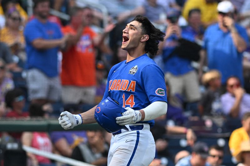 FILE PHOTO: Jun 25, 2023; Omaha, NE, USA;  Florida Gators first baseman Jac Caglianone (14) celebrates hitting a home run against the LSU Tigers in the eighth inning at Charles Schwab Field Omaha. Mandatory Credit: Steven Branscombe-USA TODAY Sports