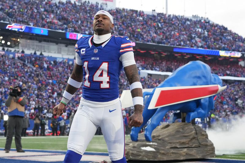 FILE PHOTO: Jan 15, 2024; Orchard Park, New York, USA; Buffalo Bills wide receiver Stefon Diggs (14) takes the field before the game against the Pittsburgh Steelers in a 2024 AFC wild card game at Highmark Stadium. Mandatory Credit: Kirby Lee-USA TODAY Sports