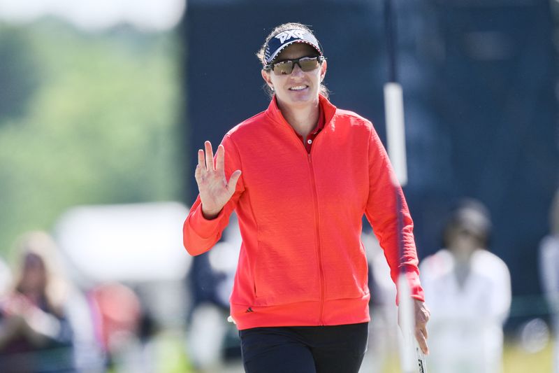 FILE PHOTO: May 31, 2024; Lancaster, Pennsylvania, USA; Brittany Lang (USA) reacts after making a putt on the 18th green during the second round of the U.S. Women's Open golf tournament. Mandatory Credit: John Jones-USA TODAY Sports/File Photo