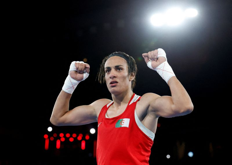 FILE PHOTO: Paris 2024 Olympics - Boxing - Women's 66kg - Final - Roland-Garros Stadium, Paris, France - August 09, 2024. Imane Khelif of Algeria celebrates winning against Liu Yang of China. REUTERS/Peter Cziborra/File Photo