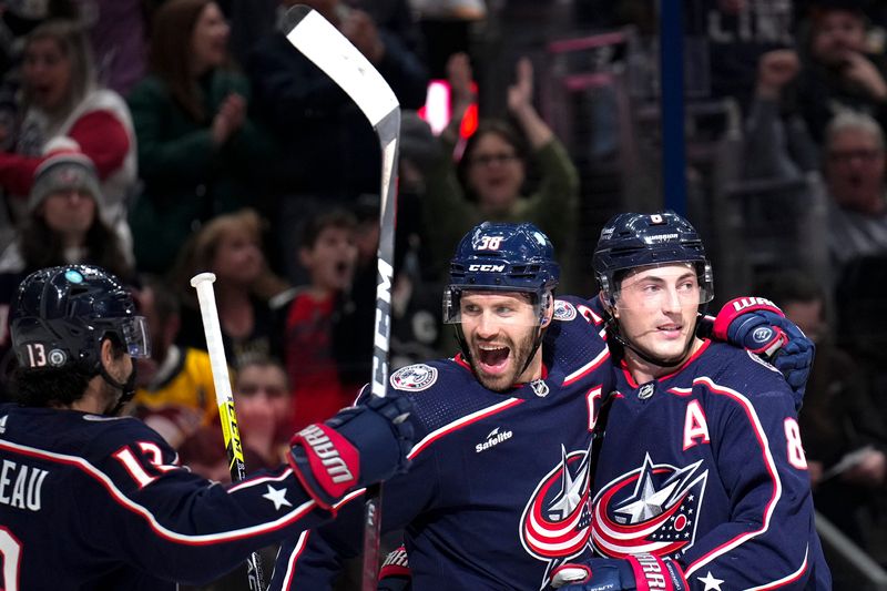 Oct 22, 2022; Columbus, Ohio, USA;  Columbus Blue Jackets forward Boone Jenner (38) and defenseman Zach Werenski (8) celebrate after Jenner’s goal during the first period of the hockey game between the Columbus Blue Jackets and the Pittsburgh Penguins at Nationwide Arena. Mandatory Credit: Joseph Scheller-The Columbus Dispatch