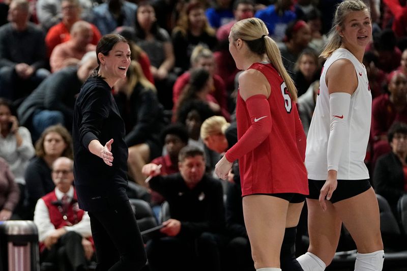 Ohio State coach Jen Flynn Oldenburg celebrates a play with Kylie Murr (6) during a first-round NCAA tournament match against Tennessee State in 2022.