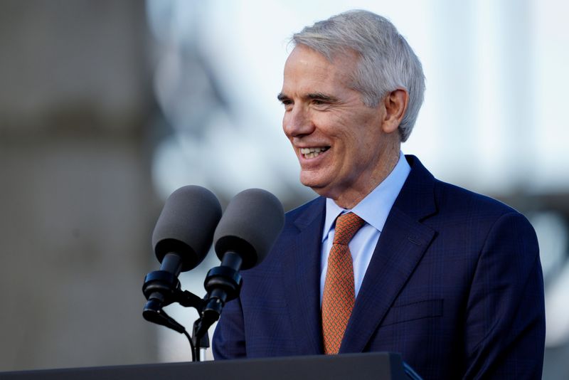 Former Ohio Senator Rob Portman speaks during an event to give remarks on the bipartisan infrastructure law which will fund major changes to the Brent Spence Bridge and surrounding infrastructure at a lot on the banks of the Ohio River in Covington, Ky., on Wednesday, Jan. 4, 2023.