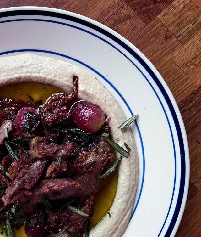 The hummus with duck confit and roasted grapes, at Abigail Street, in Over-the-Rhine.