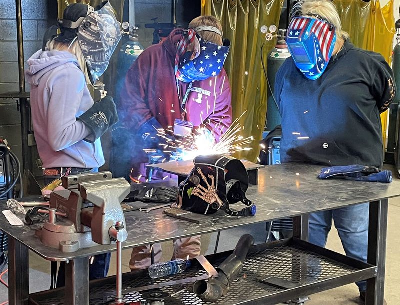 Students work on welding in metal fabrication program at the Coshocton County Career Center in this file photo. Welding is an in-demand career field and the Senior Flex Path at the career center can help students enter the workforce faster. It allows seniors to complete their academics online over the summer.
