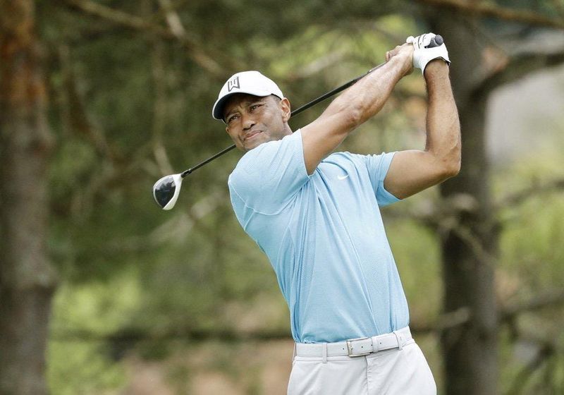Tiger Woods watches his tee shot at the second hole during the first round of the Memorial Tournament at Muirfield Village Golf Club.