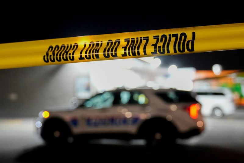 Jul 20, 2023; Columbus, Ohio, USA;  Columbus Police investigate an armed robbery at the United Food Mart on the South Side after an armed robber jumped through the drive through window and robbed the store clerk at gunpoint around 3:30 A.M.