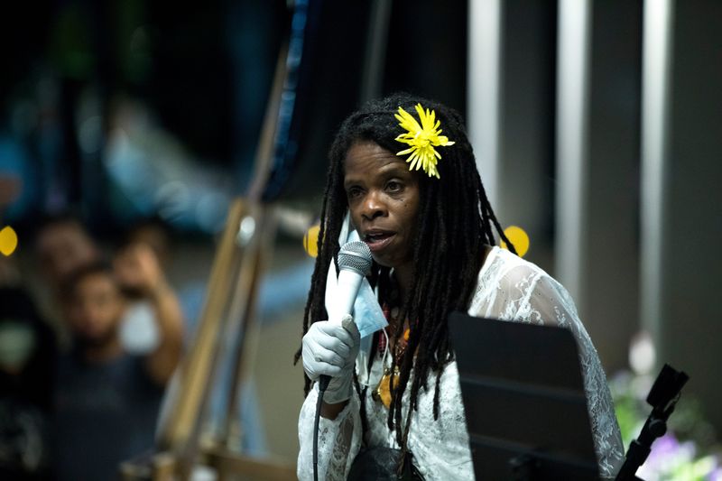 Iris Roley speaks at a rally protesting the death of Breonna Taylor in Cincinnati's Washington Park in June, 2020.  Breonna Taylor died at the hands of Louisville police after being shot in her bed at her residents while police served a "no-knock" search warrant in March 2020 in Louisville.